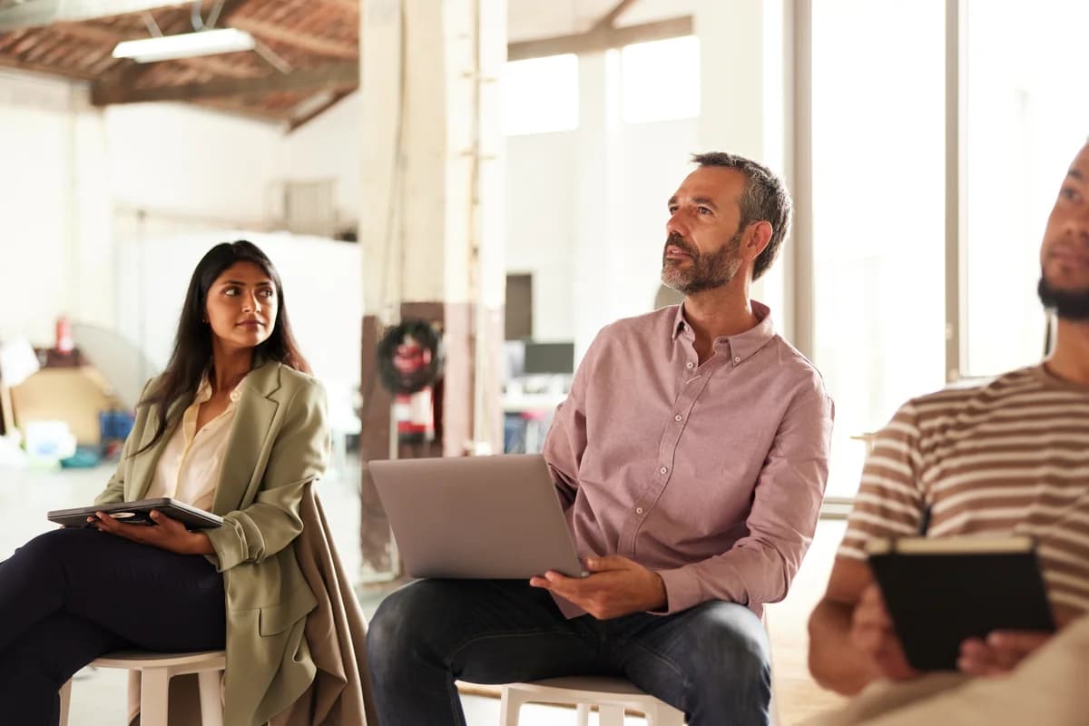 Leaders in focused discussion
